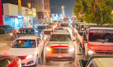 بالصور مدينة بابل العراقية : تخرج باحتفالات بعد نصر إيران وتأييد شعبي لقيادتها الدينية والسياسية